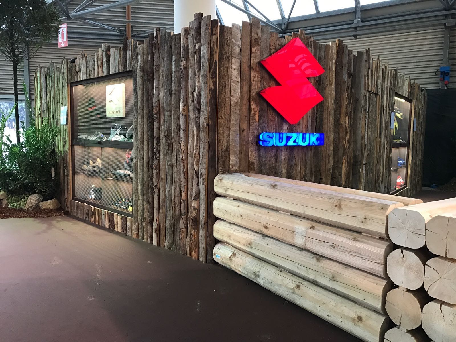 Showroom fit-out with logs and half-logs